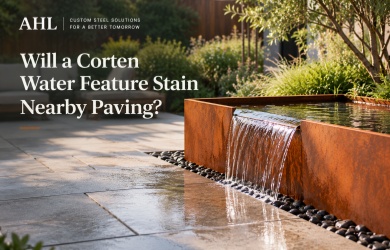 Corten water feature with paving stain prevention design
