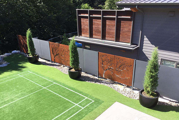 Bespoke corten steel fence for backyard playground