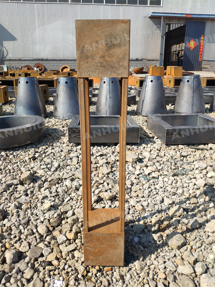 A Neatly Shaped Corten Steel Lighting That Can Stand