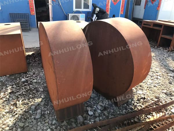Round corten steel firewood storage holder design