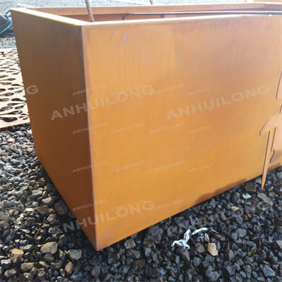 Corten steel planter with design elements