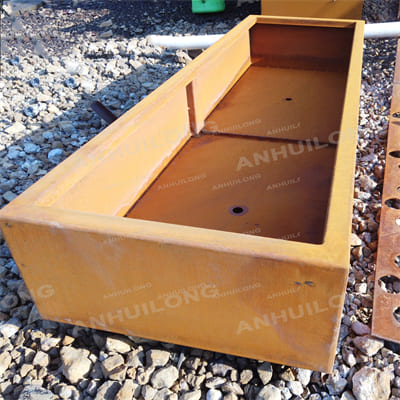 Corten steel planter with design elements