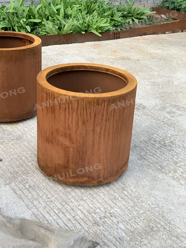 maintenance-free  corten steel cylindrical planter for ornamental garden