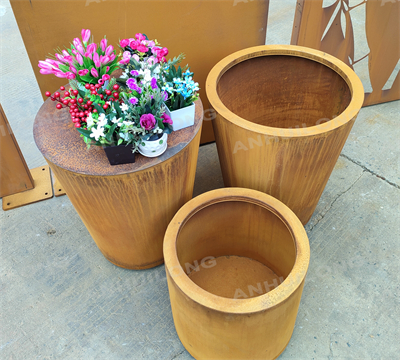 Rusty weatherproof steel flower basin at the entrance