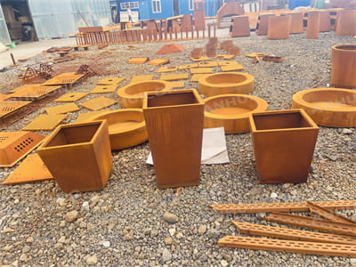 Tall and sleek corten steel planter for outdoor