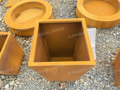 Tall and sleek corten steel planter for outdoor