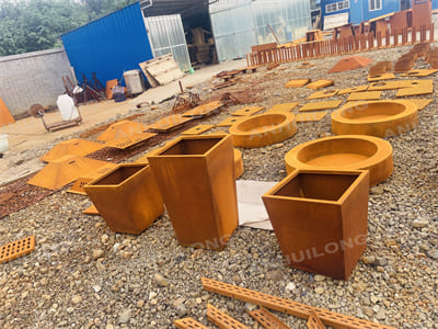 Tall and sleek corten steel planter for outdoor