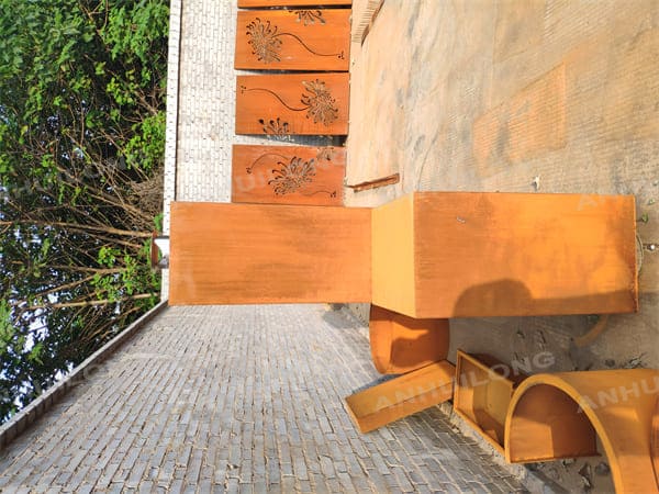 maintenance-free  outdoor corten steel fireplace with firewood storage