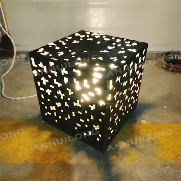 Industrial-themed corten lightbox with laser cut design