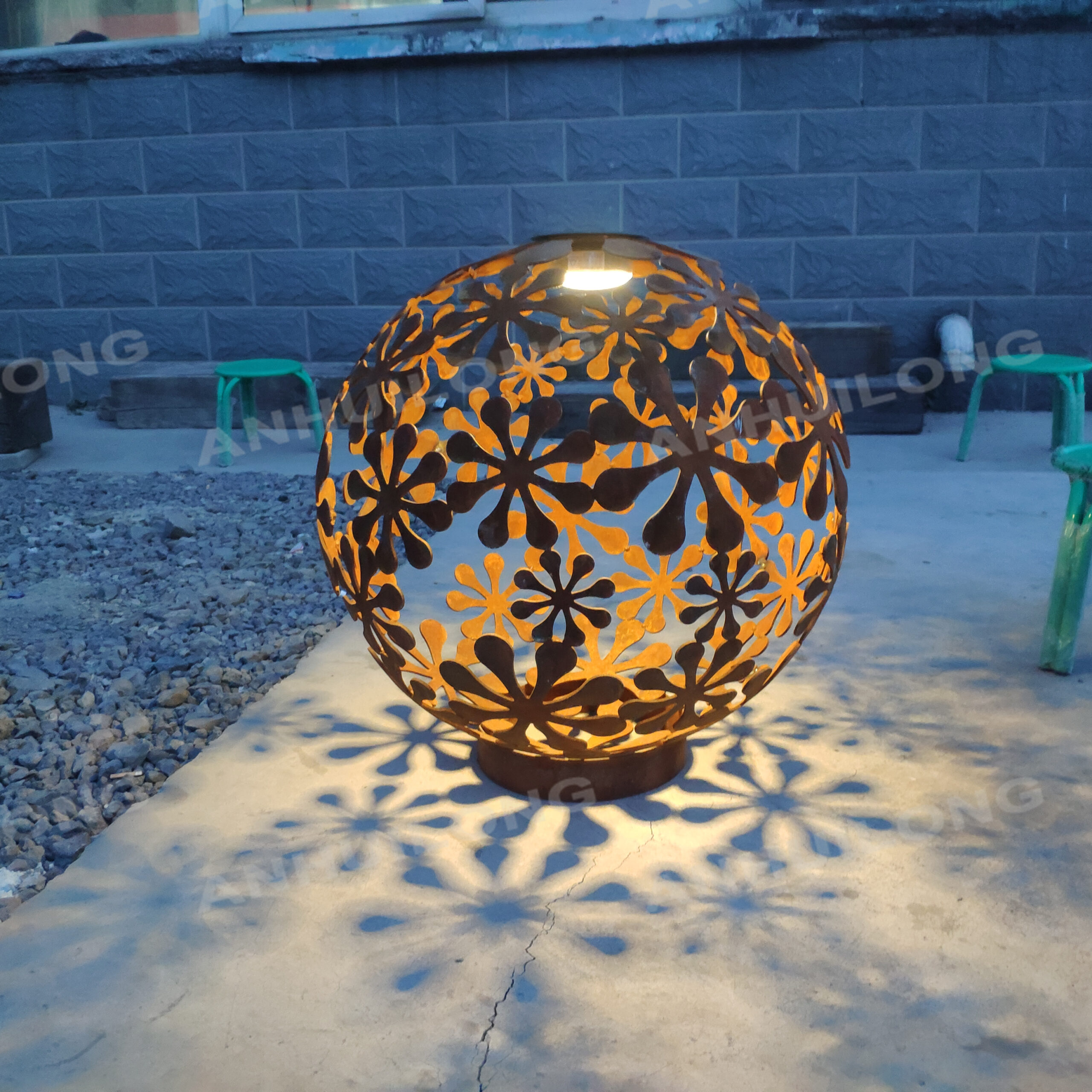 Industrial-themed corten lightbox with laser cut design