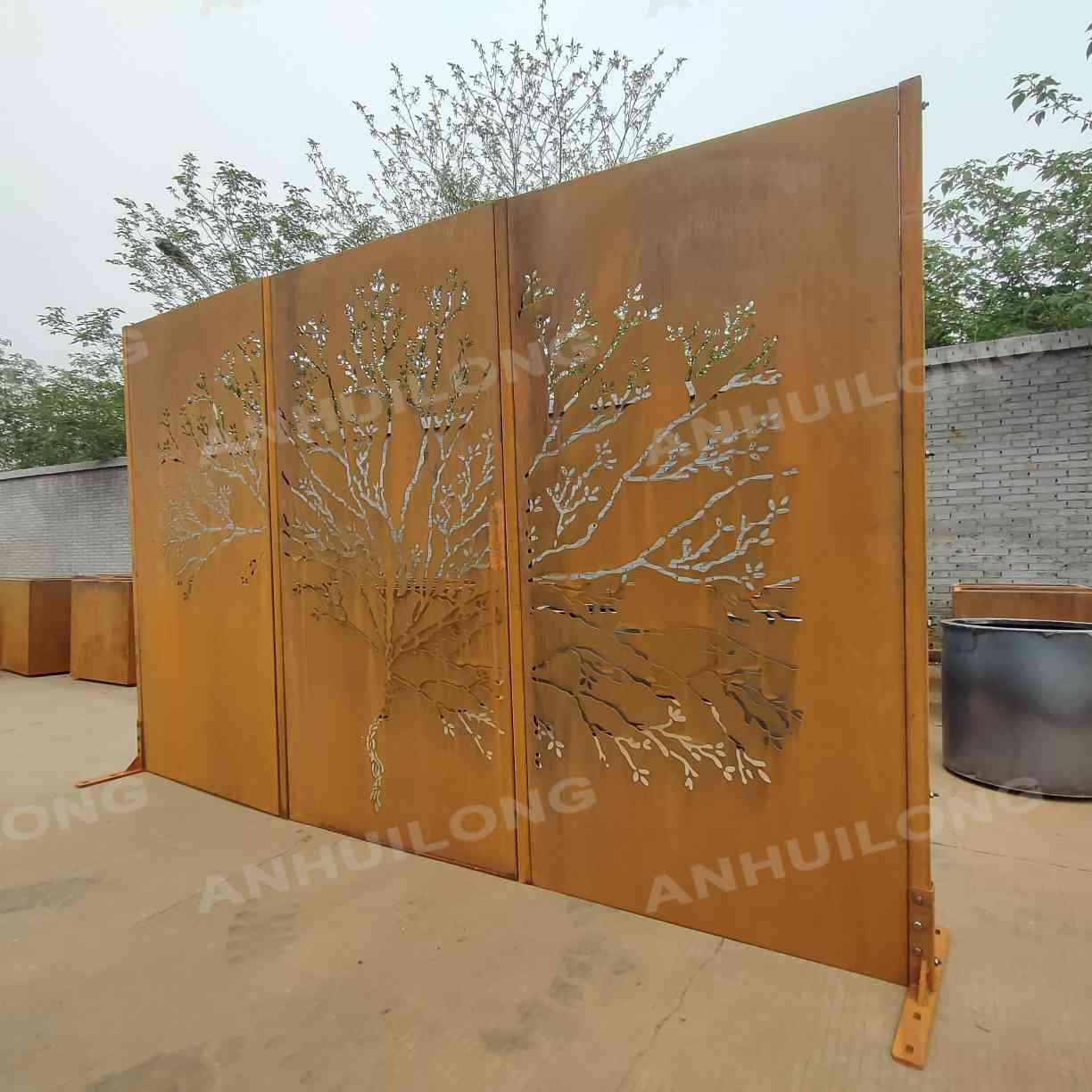 Perforated corten steel fence for landscaping