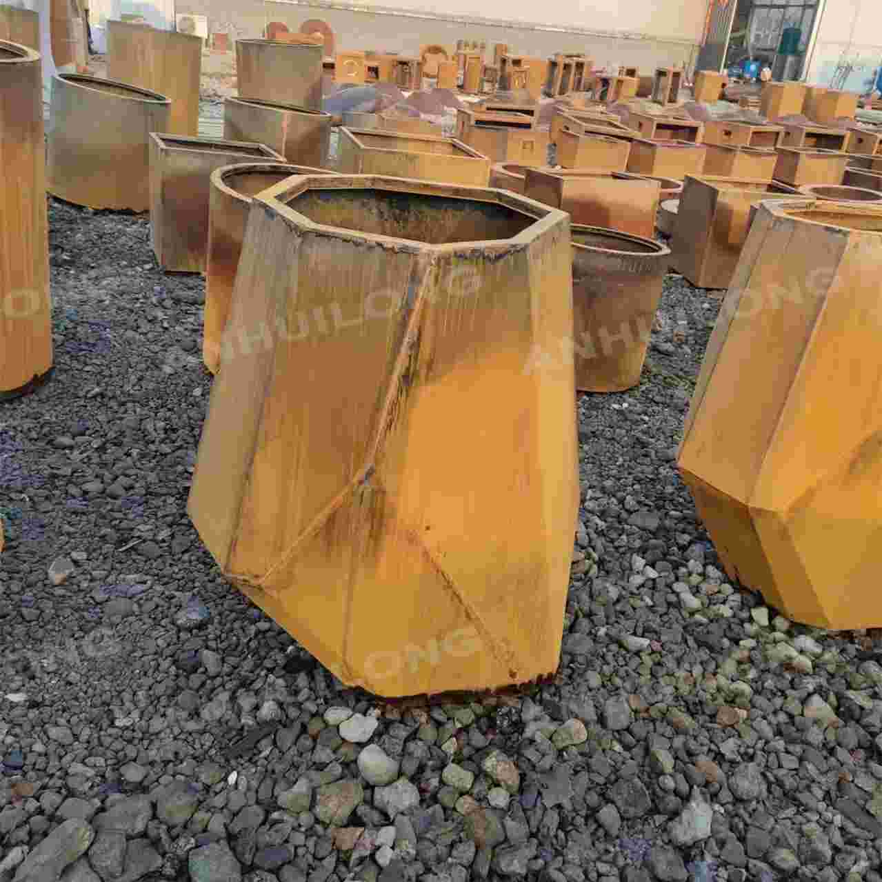 Industrial style corten steel planter for holiday village