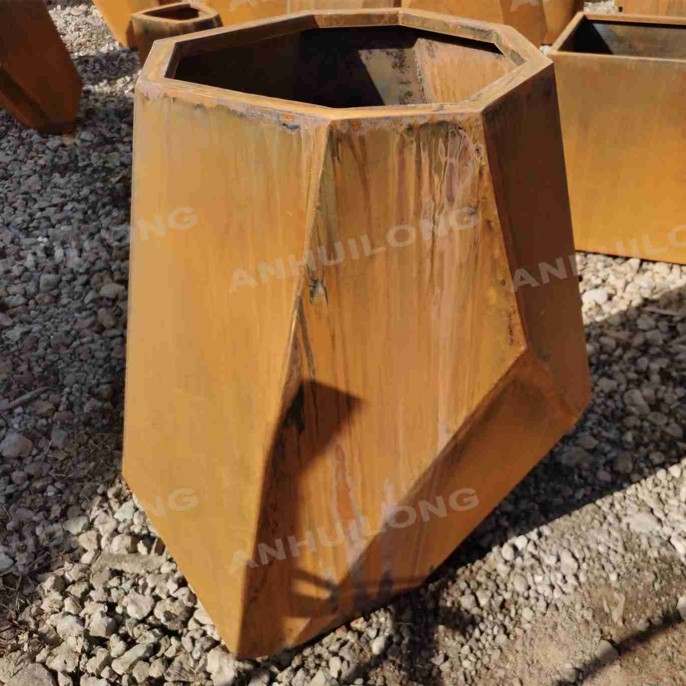 Industrial style corten steel planter for holiday village